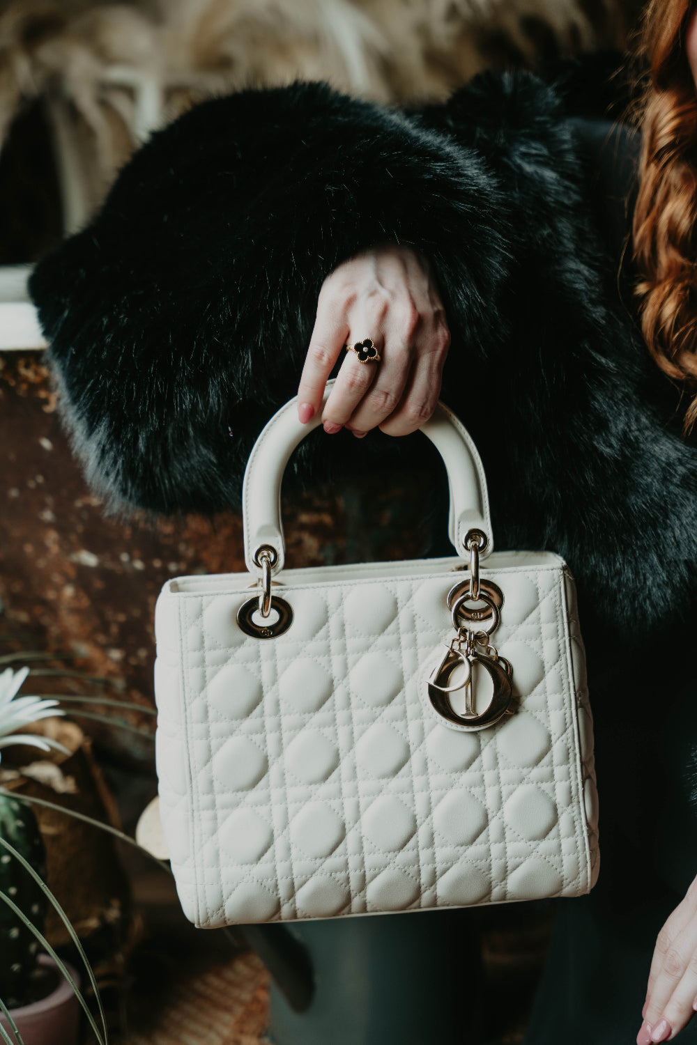 Women holding Dior bag