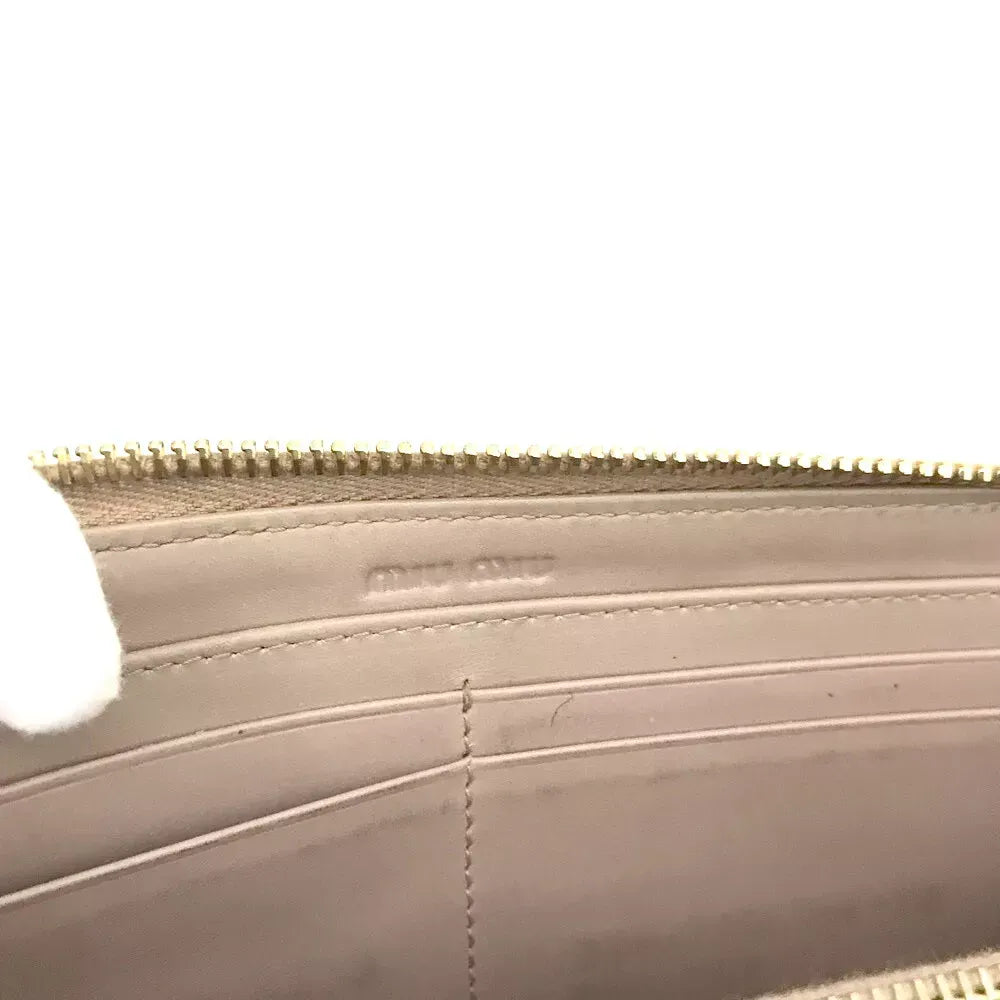 Pre-Owned Authentic Miu Miu Gold Croc Long Zippy Wallet