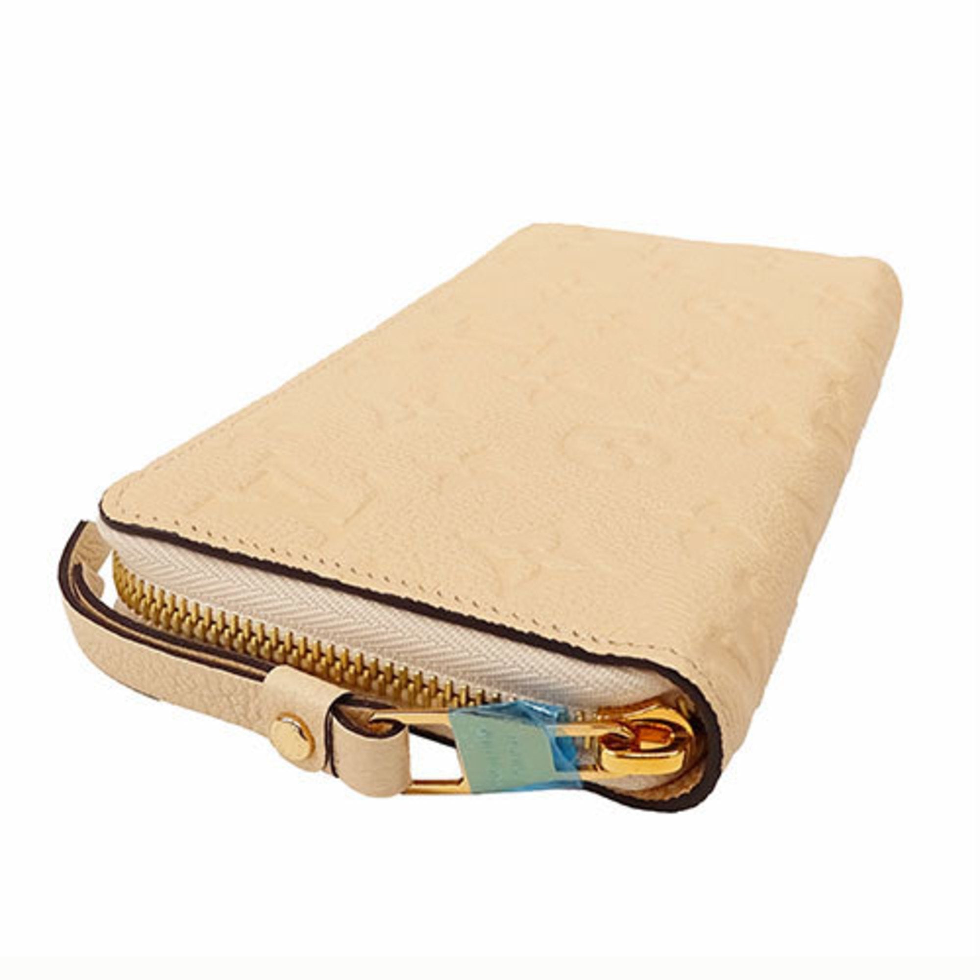 Louis Vuitton Long Monogram Empreinte Zippy Wallet Crème Light Beige M82212