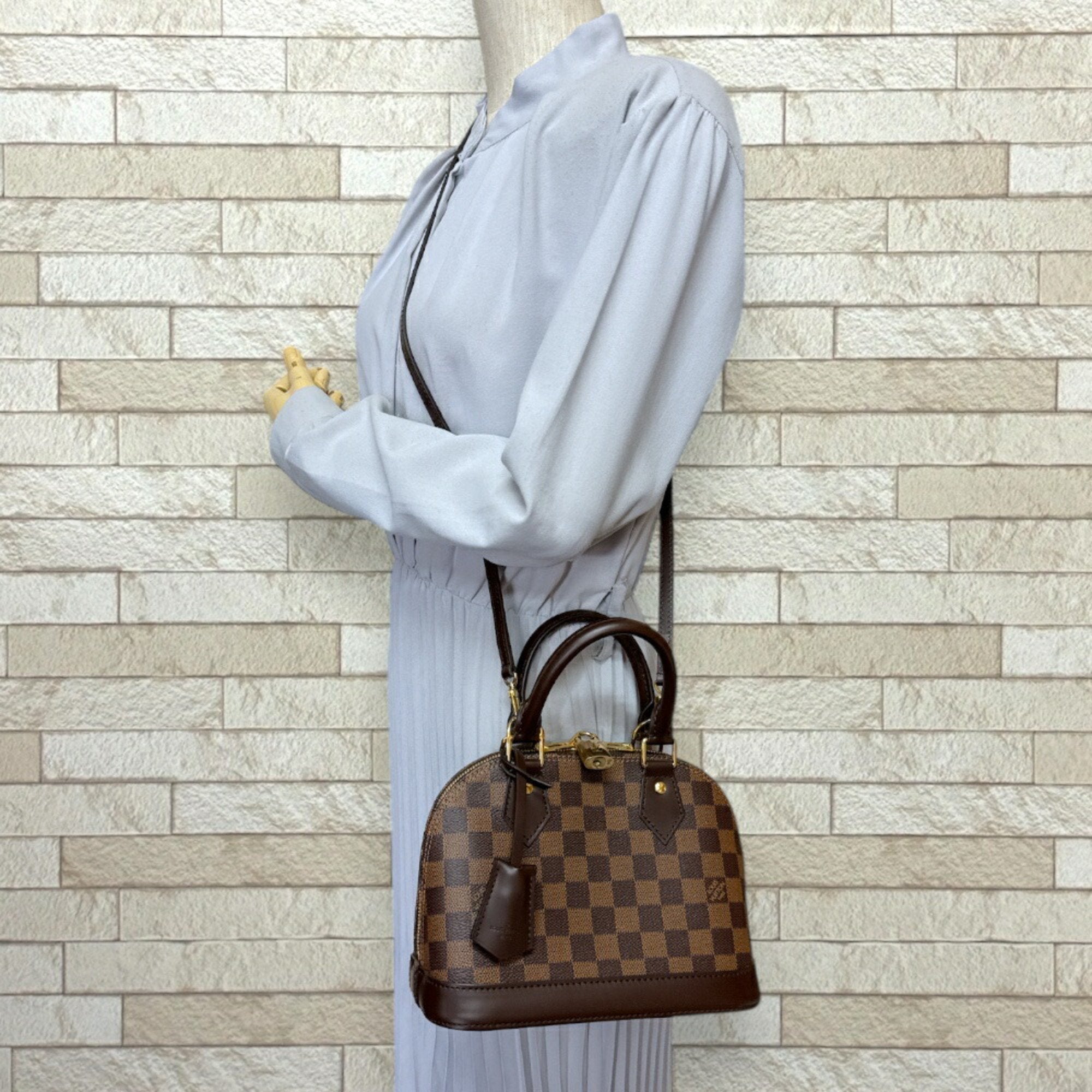 Louis Vuitton Alma Bb Damier Canvas Bag Brown N40606