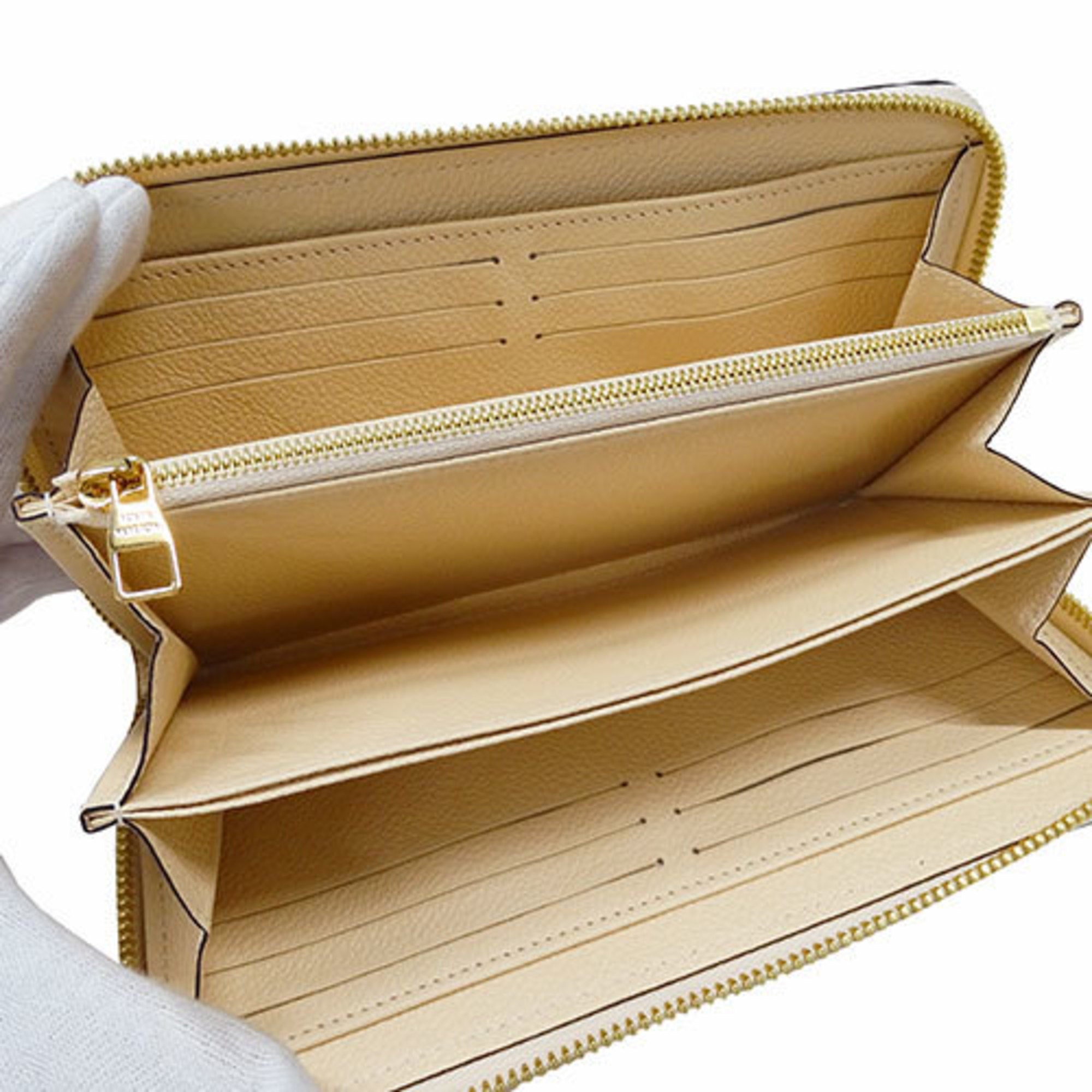 Louis Vuitton Long Monogram Empreinte Zippy Wallet Crème Light Beige M82212